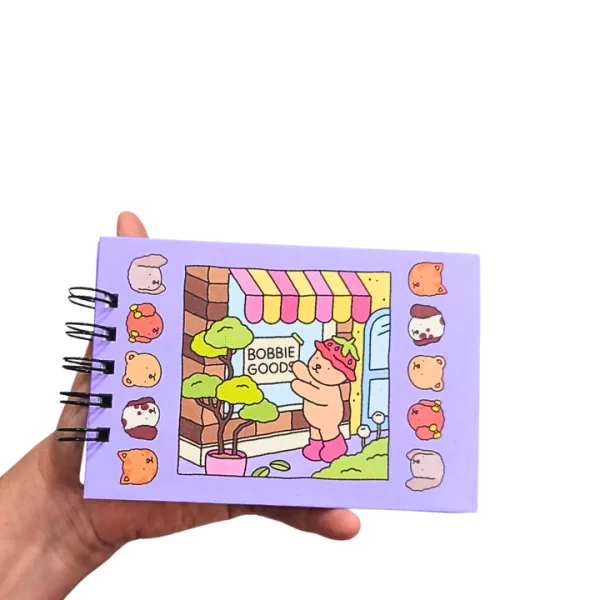 Mini-Livro-de-Colorir-Bobby-Goods-lilas-Edi-o-de-Bolso-4-1.png