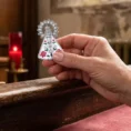 Broche-Nossa-Senhora-de-Nazar-prata-1.png